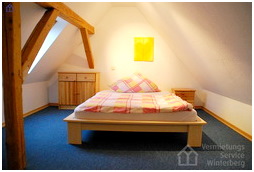 Schlafzimmer mit Doppelbett